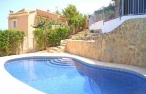 Apartment with pool, mountain views, in Javea